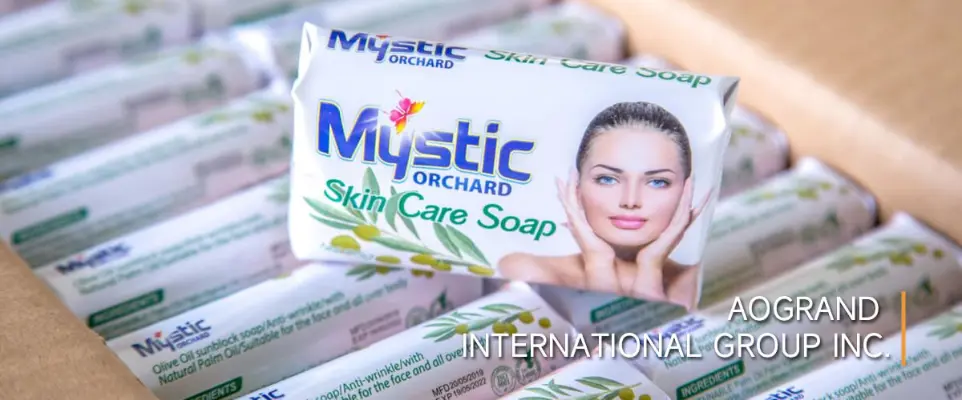 Mystic Orchard soap bars on production conveyor ready for private label packaging.